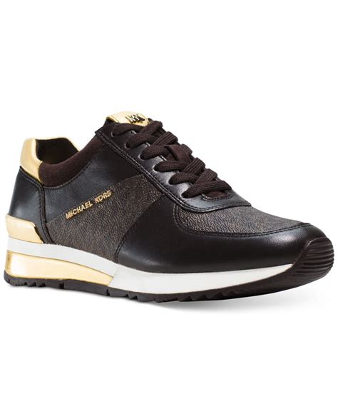 michael kors allie trainer sneakers black and gold|michael kors allie stride size.